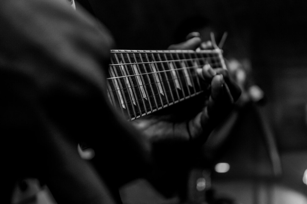 musician playing guitar